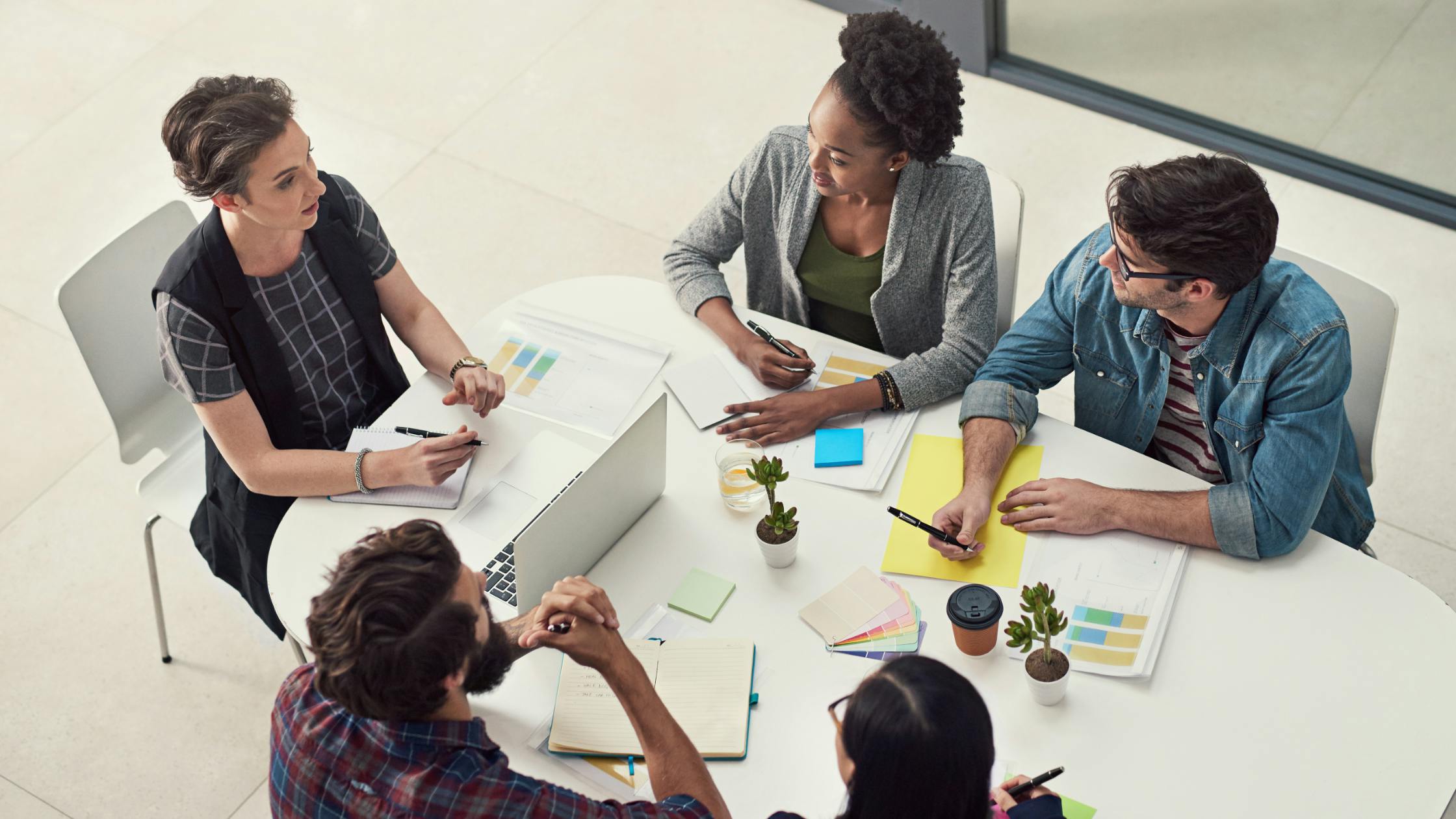 Group of people is having coaching meeting