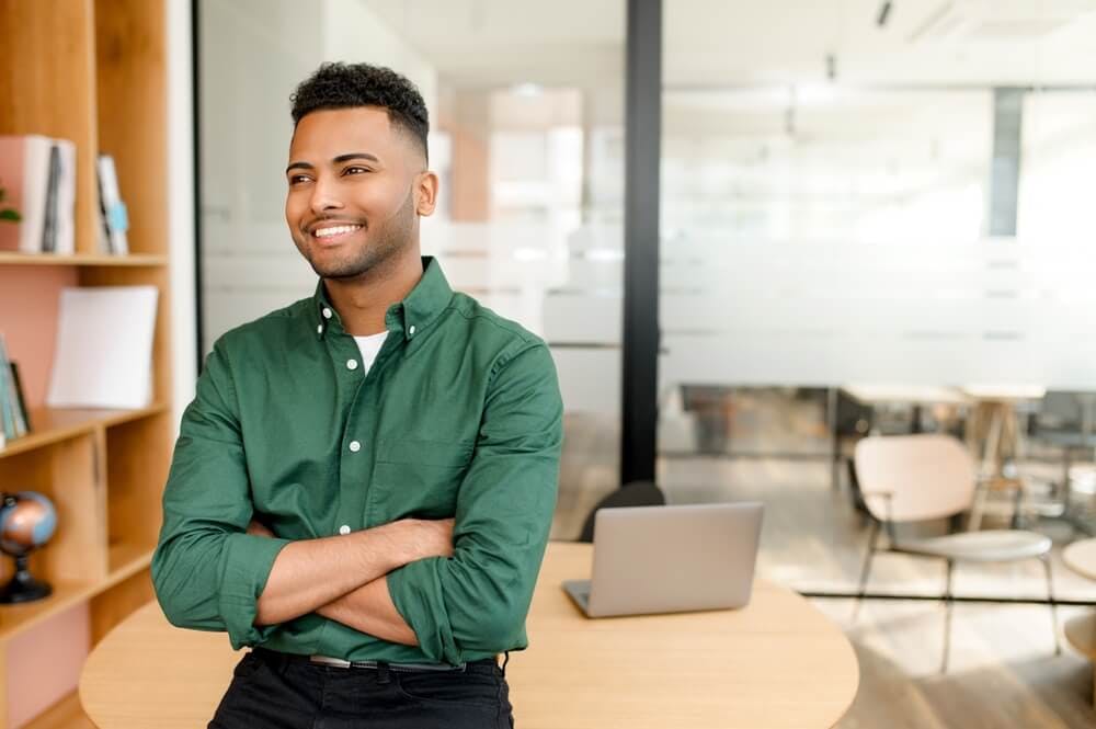 happy and confident male employee