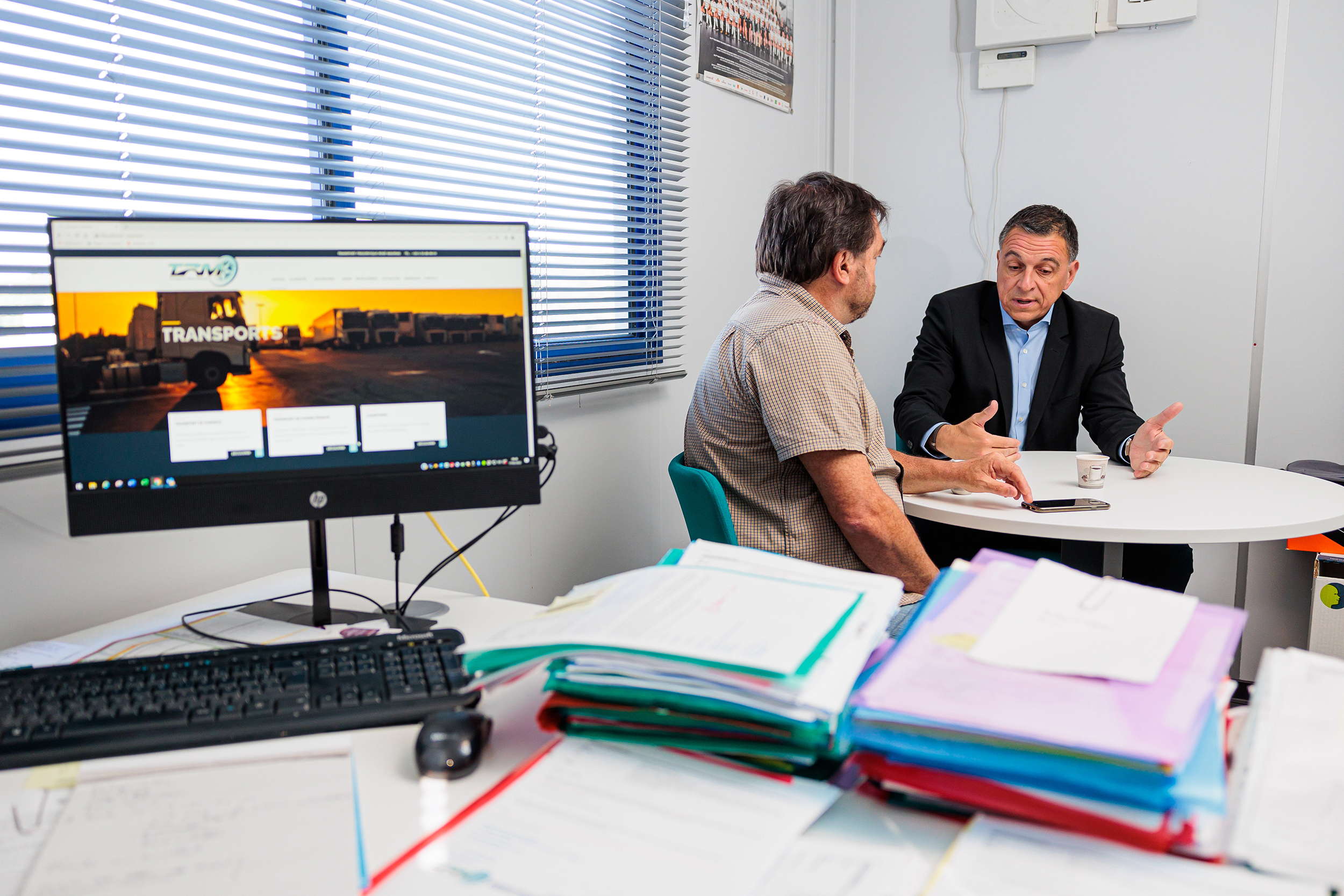 Mr Bordier et Mr Condomine en réunion 