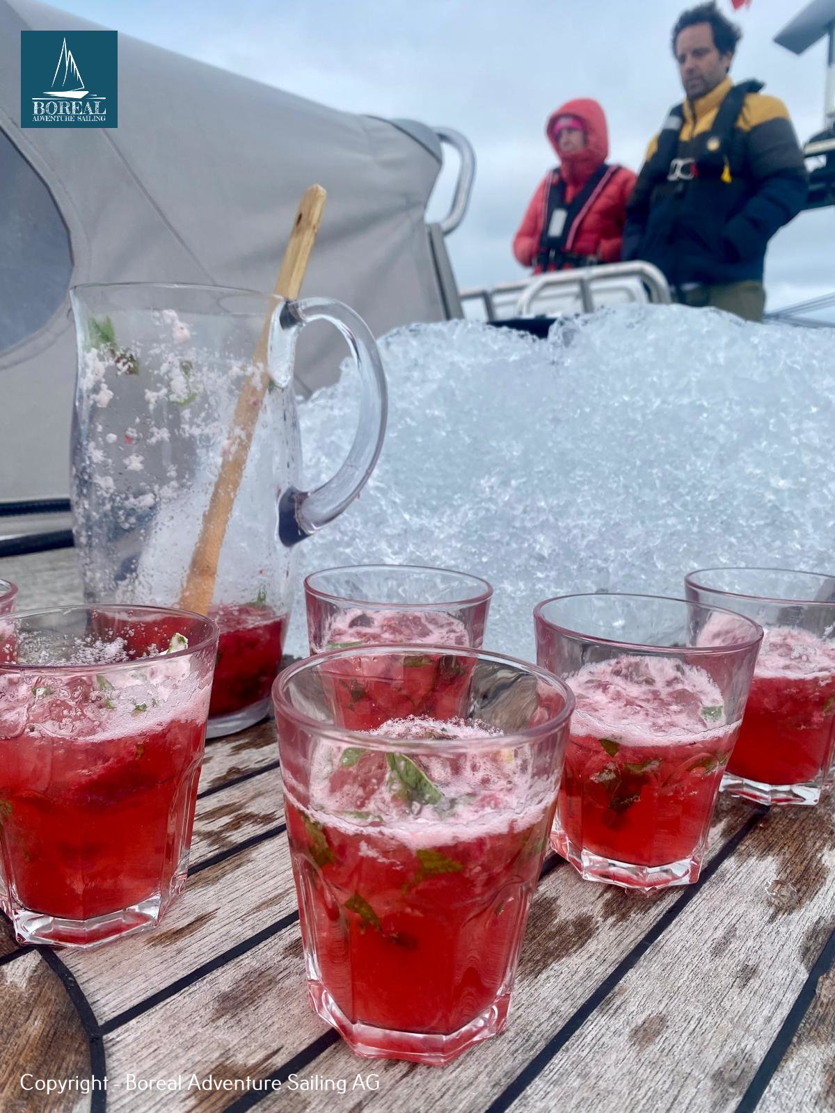 Sail & Explore, Svalbard: red berry cocktails with mint on deck beside a mound of ice