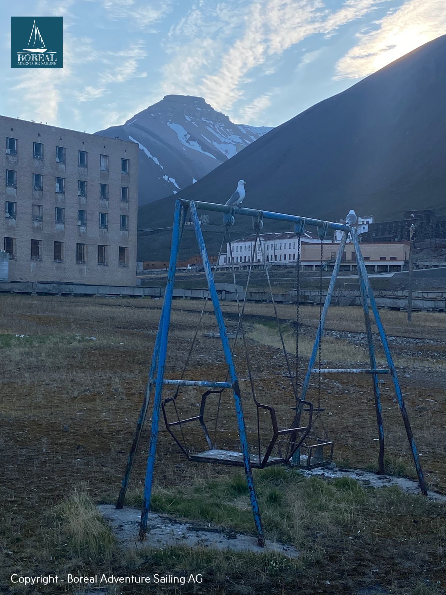 Sail & Explore, Svalbard: abandoned playground swings in the Soviet ghost town of Pyramiden