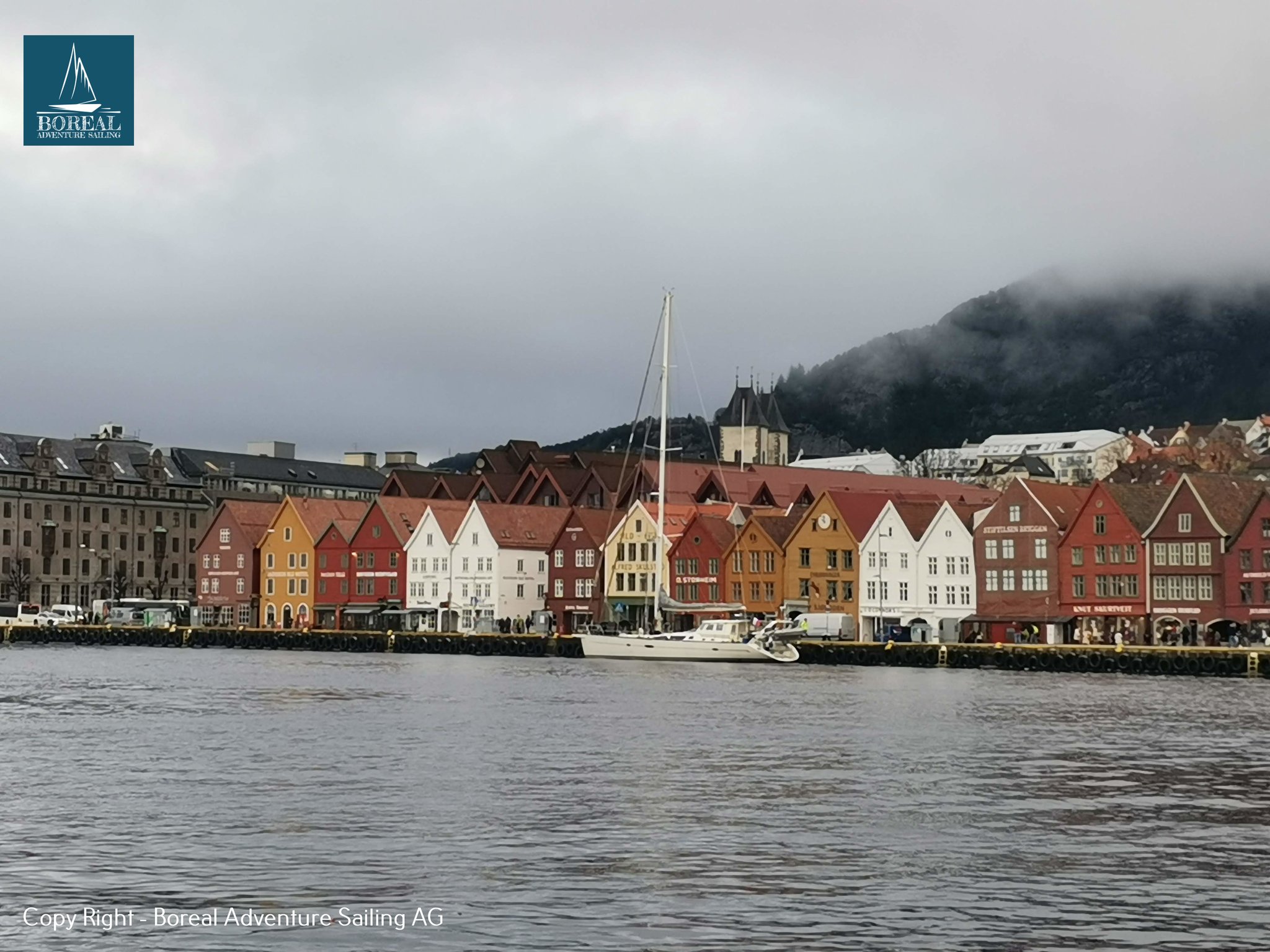 Offshore Sailing: sailing yacht moored along Bergen's historic Bryggen waterfront