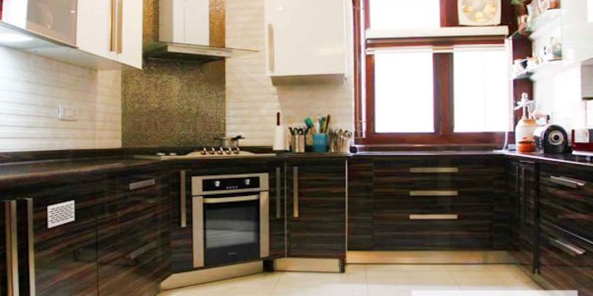 How To Design A Modular Kitchen With A Tight Budget: Blog Poster