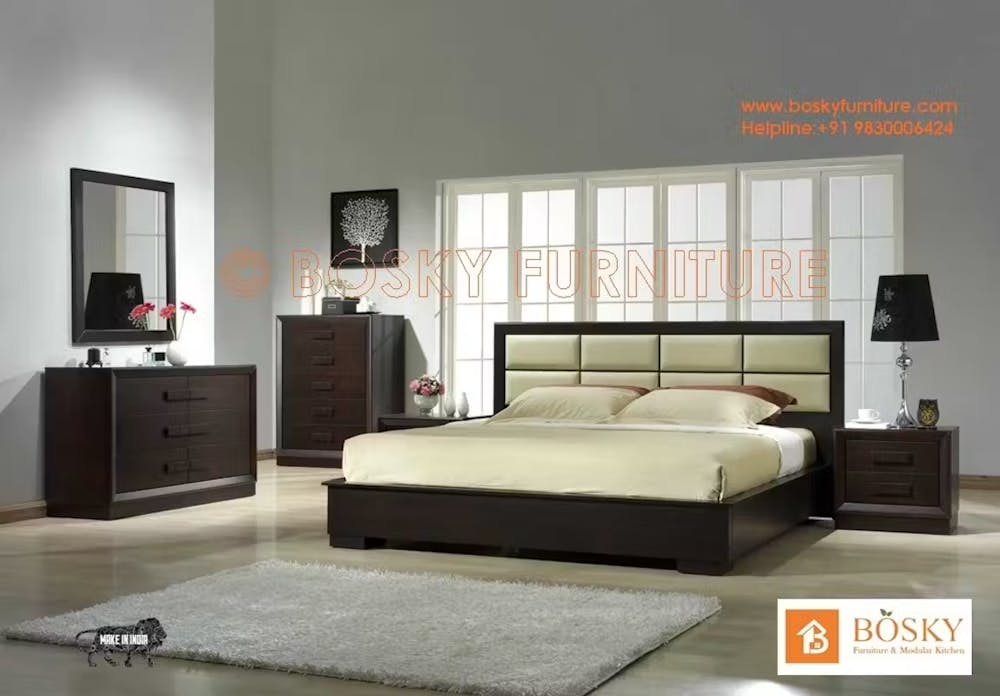 A white bedhead bed in a bedroom