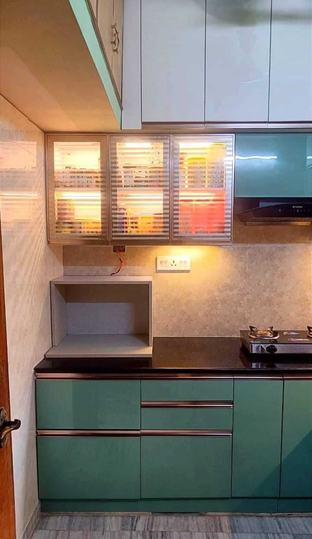 Glass sliding drawer in modular kitchen pic