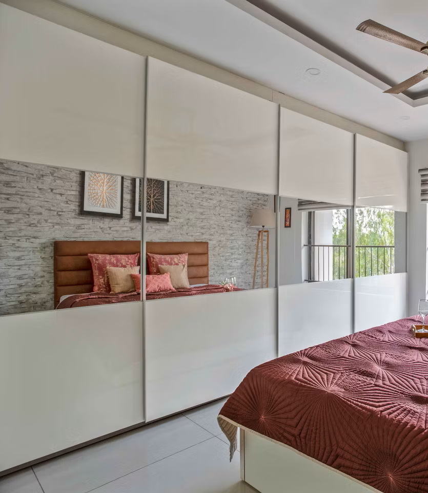 Pearly white sliding mirrored wardrobe design ideas