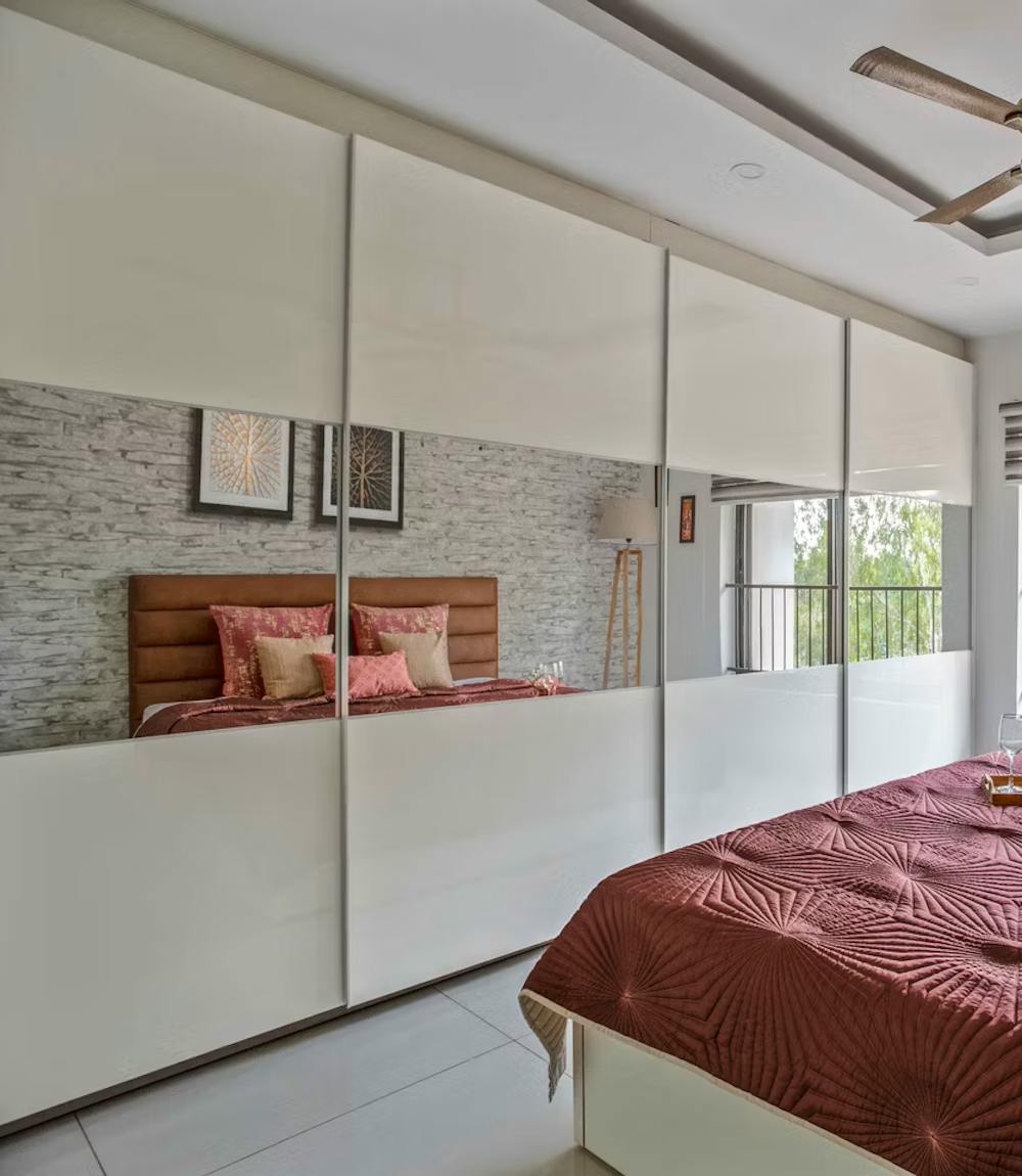 Pearly white sliding mirrored wardrobe design ideas