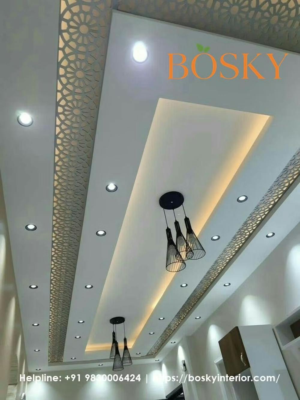 Pannelled and bordered ceiling design in false ceiling