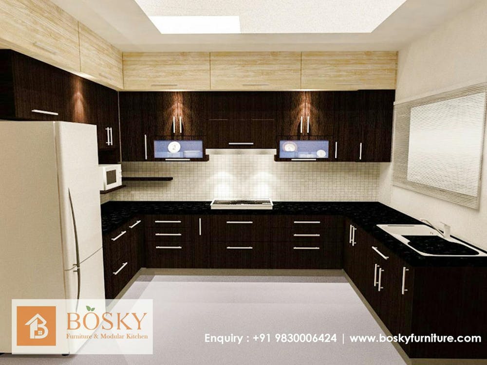 Elegant Wooden Cabinets with White Tiled Backsplash in the Kitchen | Bosky Interior Design