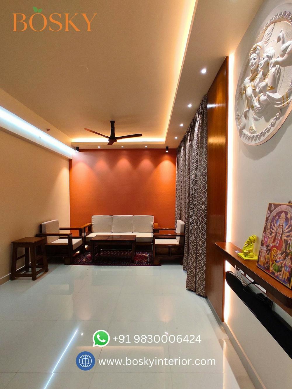 Deep orange, light orange and white living room colour combination | Bosky Interior