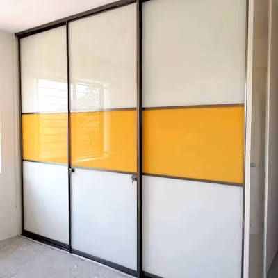 Yellow and white lacquered wardrobe design