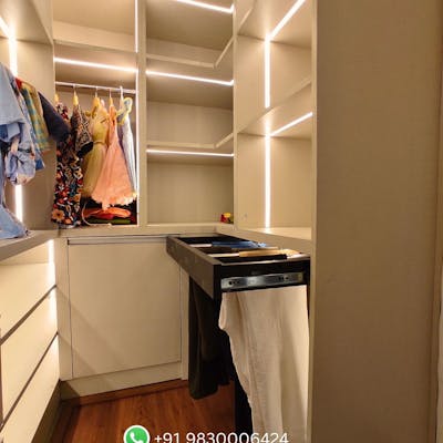 White-colored walk in closet pic