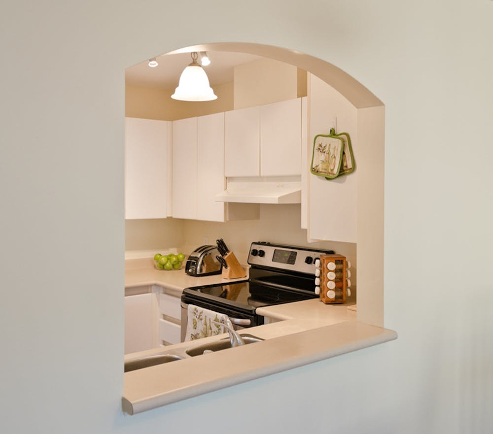 Small Arch Opening in Kitchen | Romakoma/ shutterstock