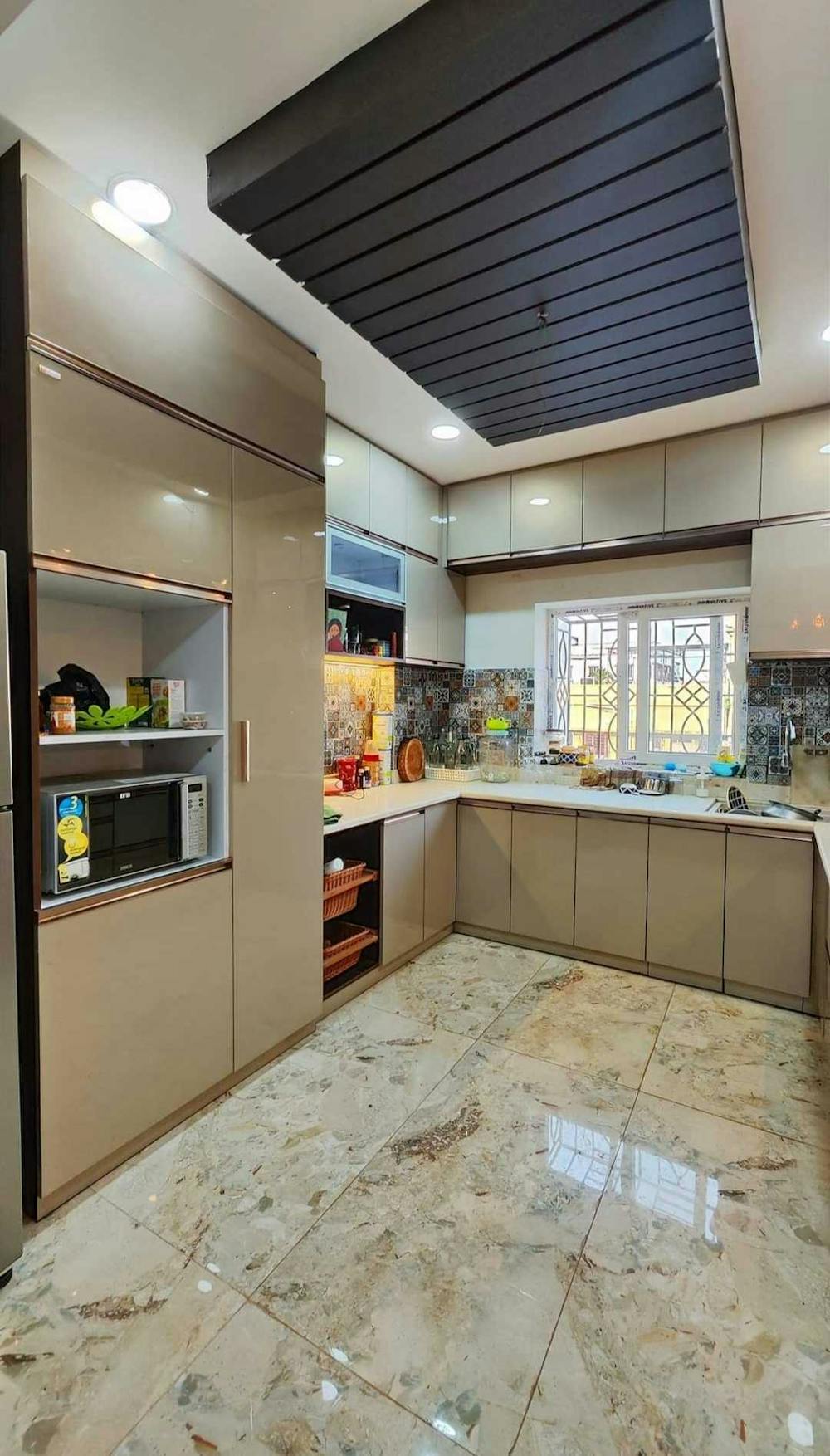 Modular kitchen with wrecker basket trolley drawer