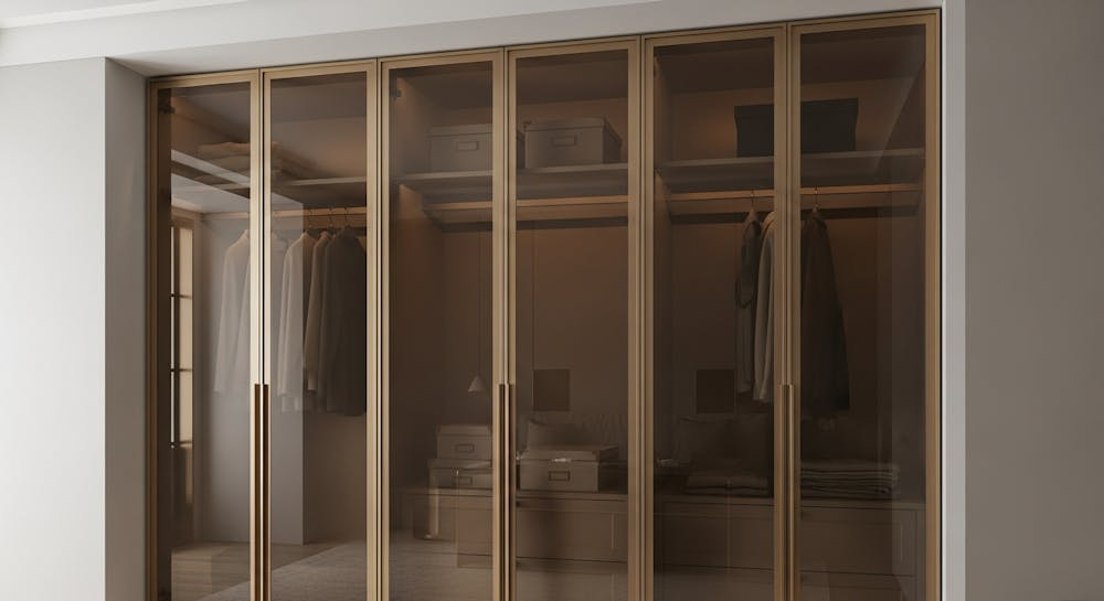 bronze glass with brushed gold frames,