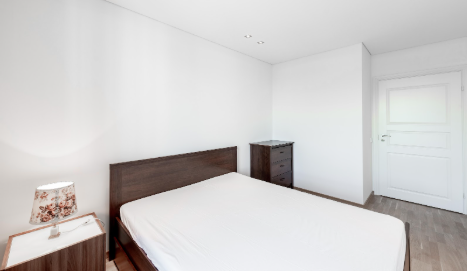 Minimalist Bedroom with Wooden Accents