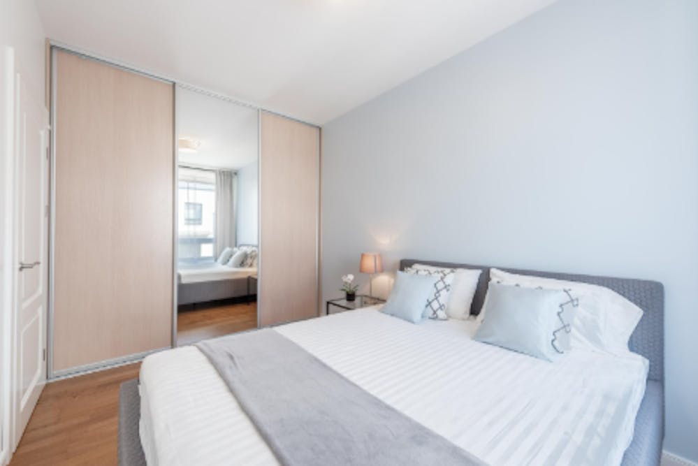 Minimalist Wardrobe with Handle-less Finish