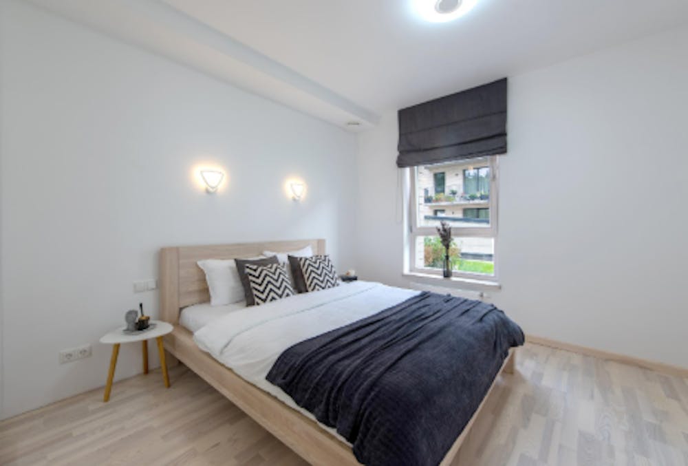 Minimalist Bedroom with Sheer Curtains