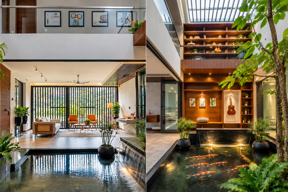 Luxury modern home interior with indoor reflecting pool, koi pond, open living area, and floor-to-ceiling windows surrounded by greenery.