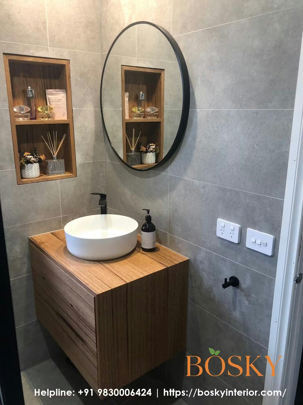Fancy wash basin with round mirror and beautiful background