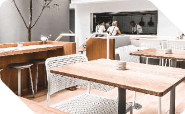 Clean wooden tables ready to serve in restaurant