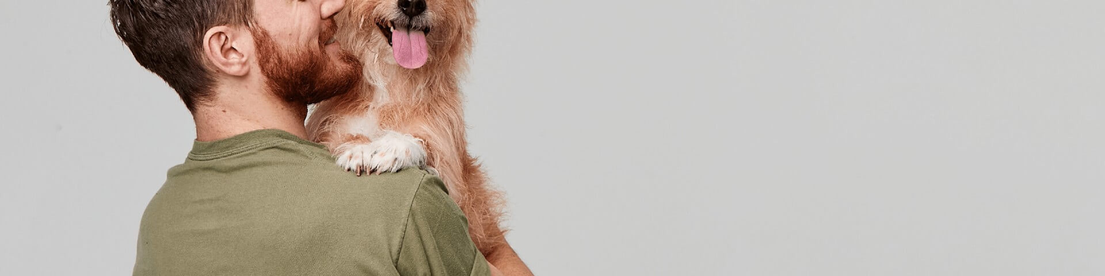 Man holding dog