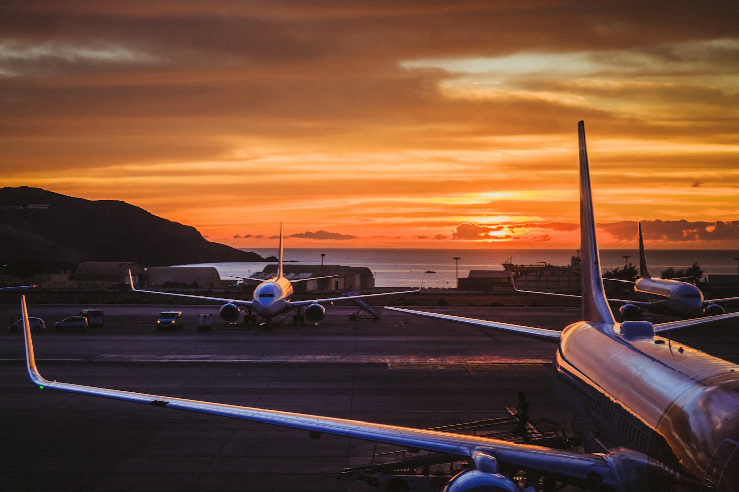 Planes parked at LaGuardia Airport in NYC at sunset