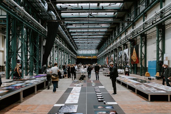 Indoor exhibition visited by curious attendees