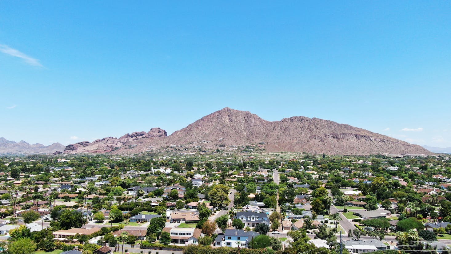Visiting the sprawling city with distant mountains on a layover in Phoenix