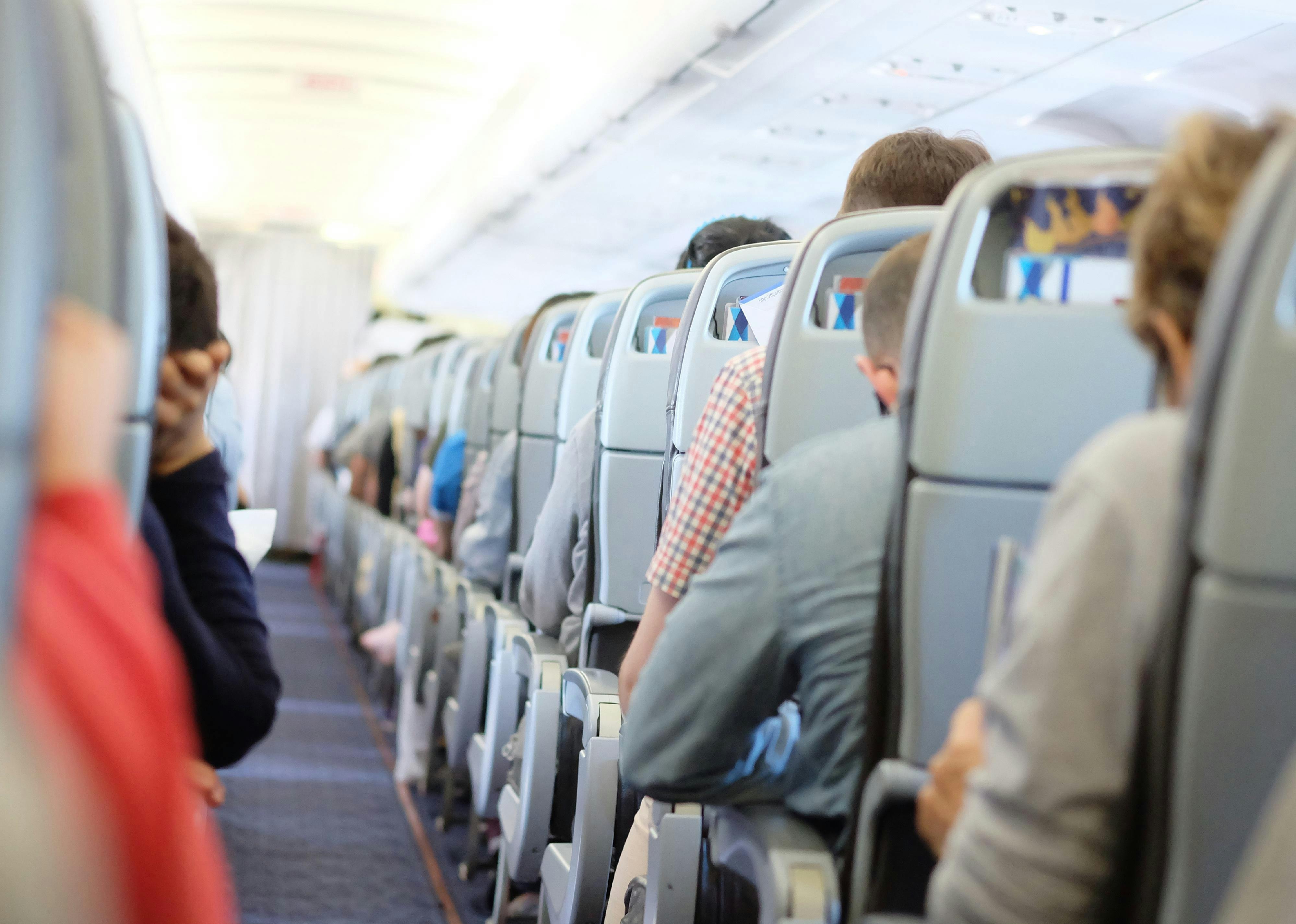 Premium Photo  A bottle of water for passenger on the aircraft