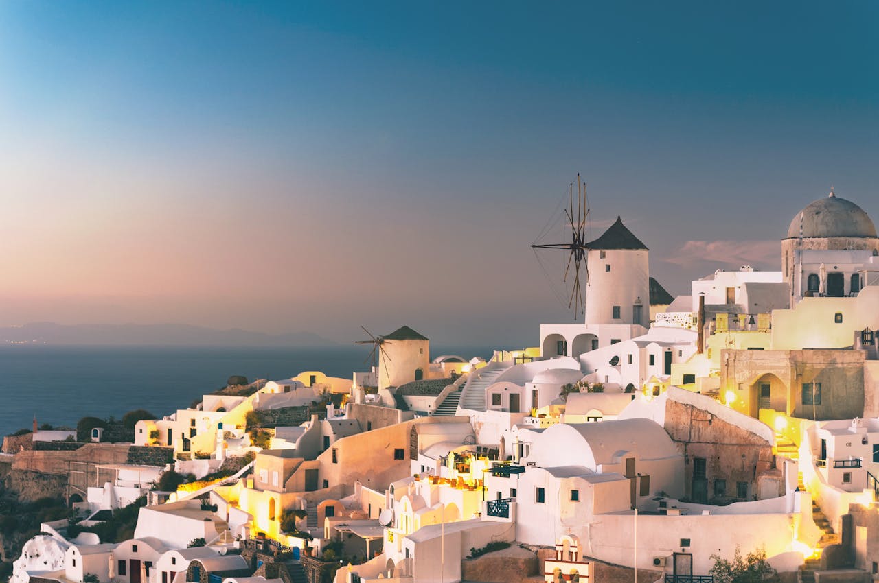Santorini, Greece overlooks the Aegean Sea at sunset Santorini, Greece overlooks the Aegean Sea at sunset
