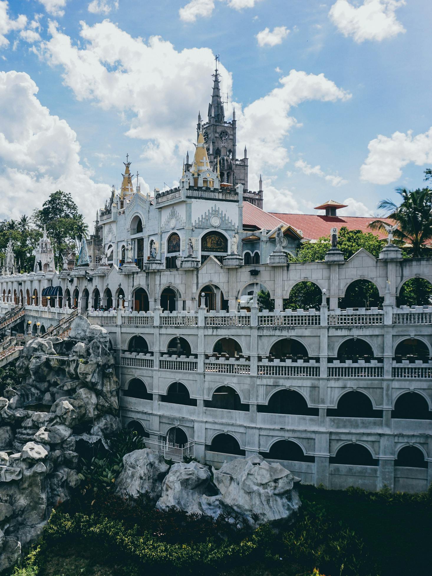 The aged white structure of the Simala Shrine in Cebu