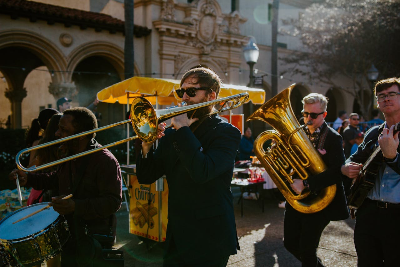 Brass band in formal wear performing on the street