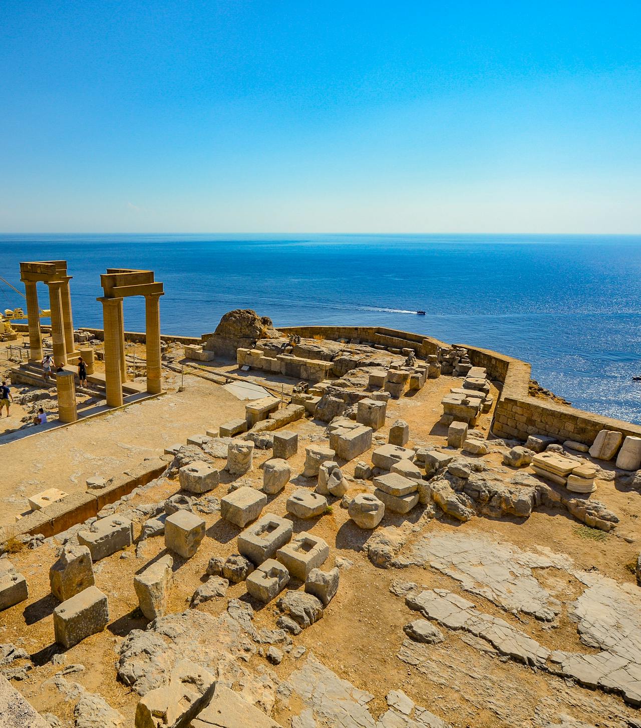The Lindos Acropolis in Rhodes with views out to the Mediterranean Sea The Lindos Acropolis in Rhodes with views out to the Mediterranean Sea