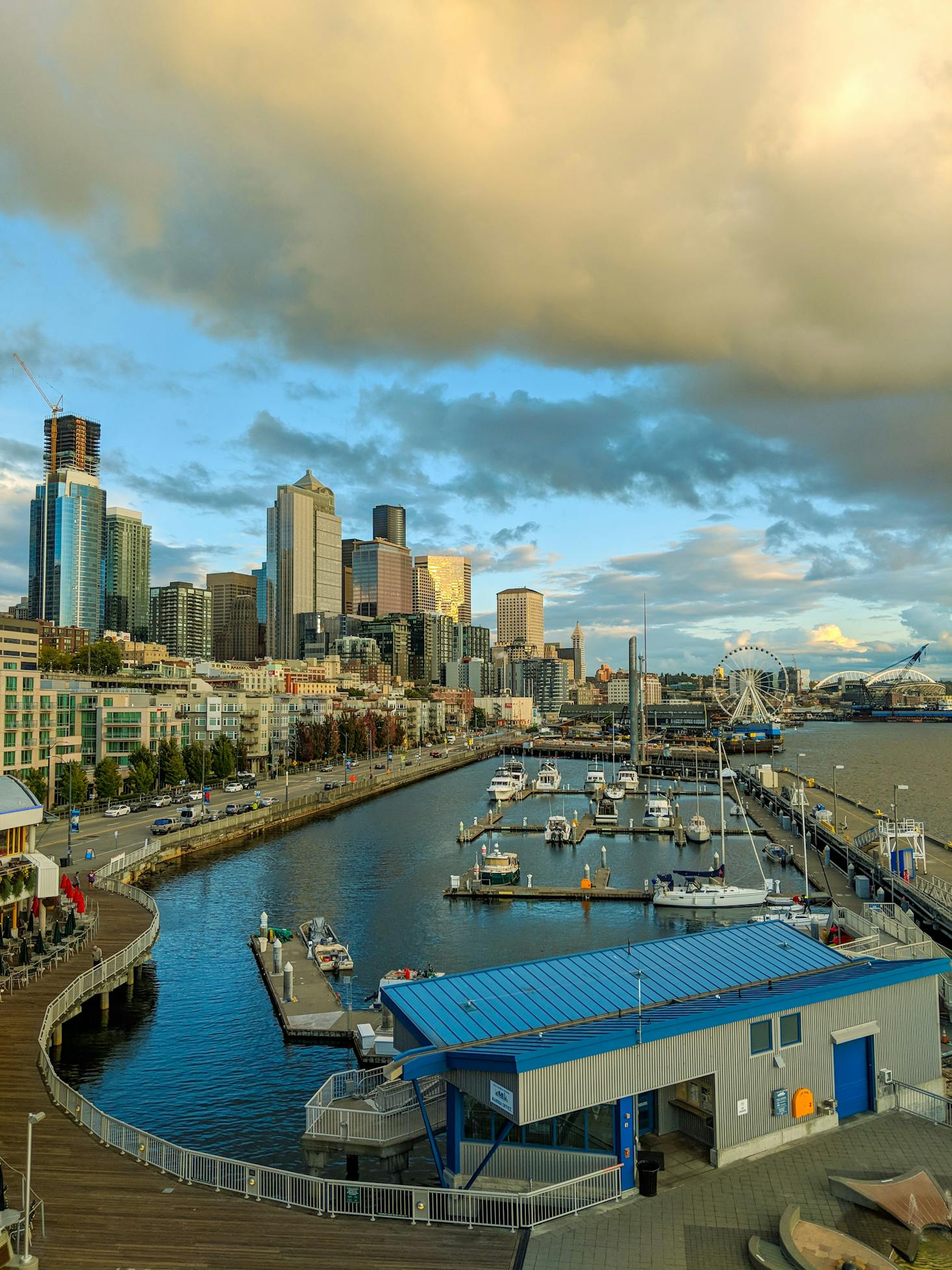 A marina on the edge of Downtown Seattle with skyscrapers in the background