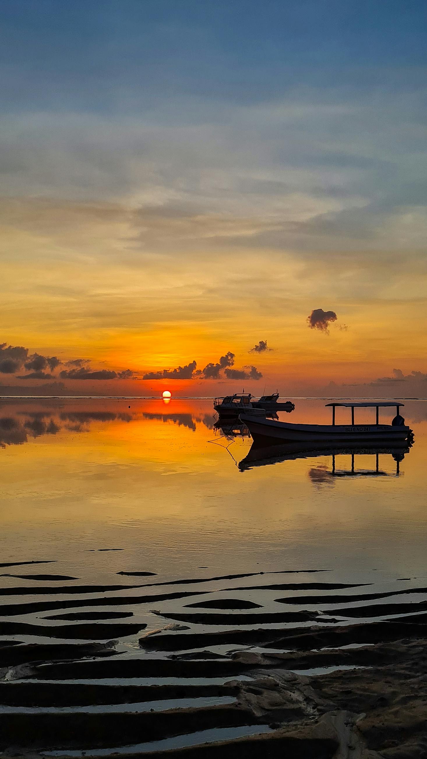 Sunset off the coast of Sanur in Bali