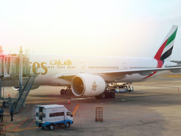 Plane on runway at Manchester Airport, UK