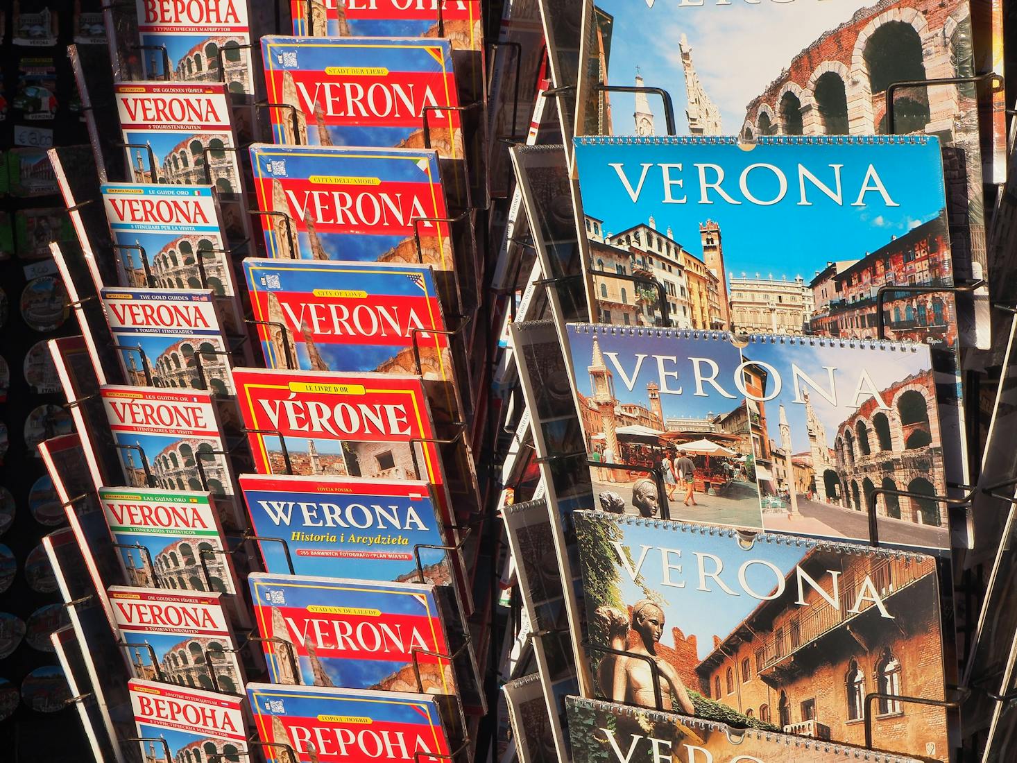 Close up of magazines and maps for Verona stacked on a stand