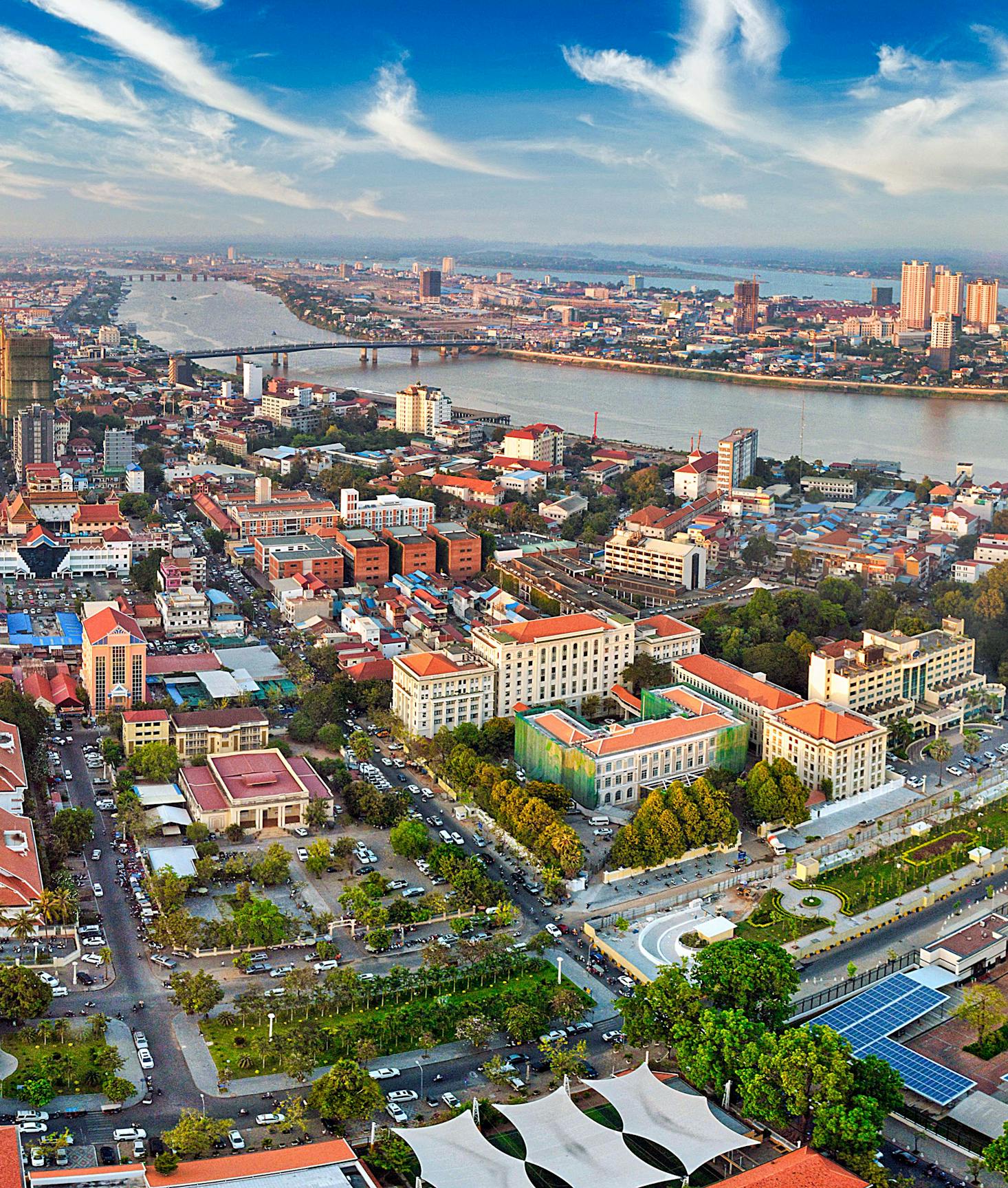 Colorful buildings line the river water system in Phnom Penh, Cambodia