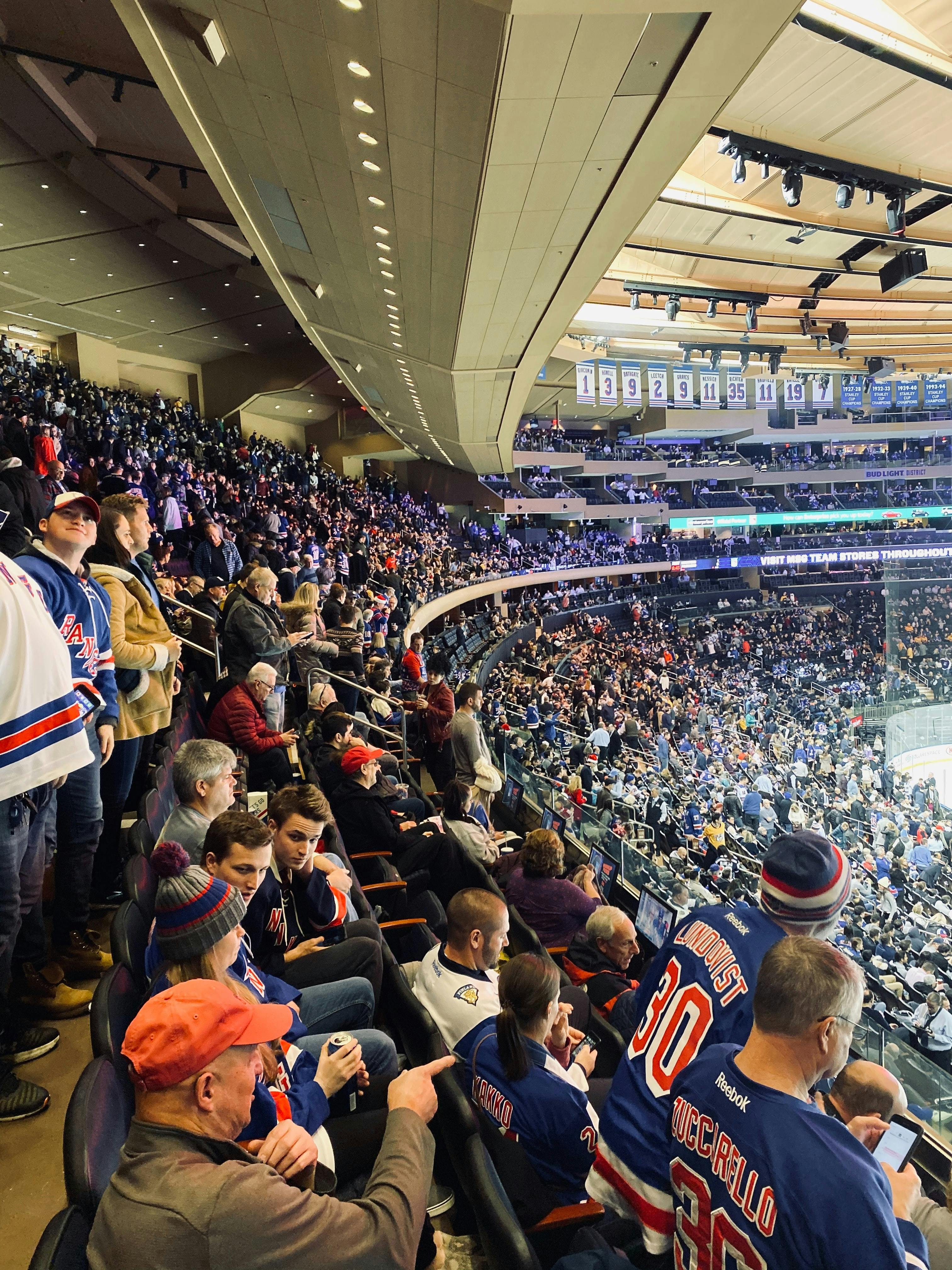 Spectators watching ice hockey game at Madison Square Garden