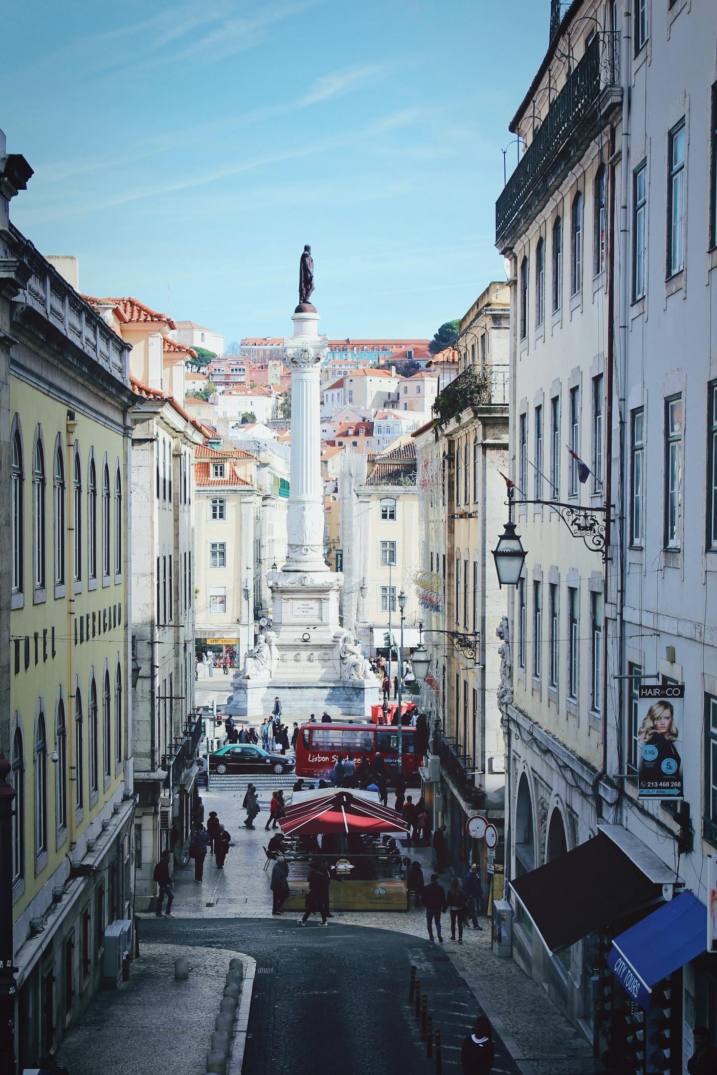 Aerial view of Rossio Square in Lisbon with a large white fountain