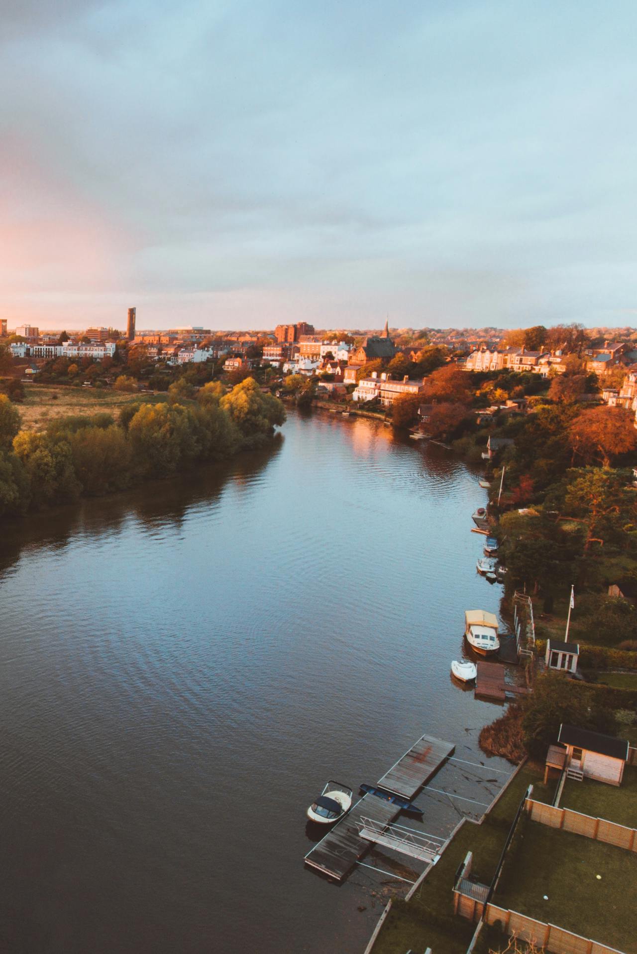 Buildings and trees line the River Dee in Chester, England Buildings and trees line the River Dee in Chester, England