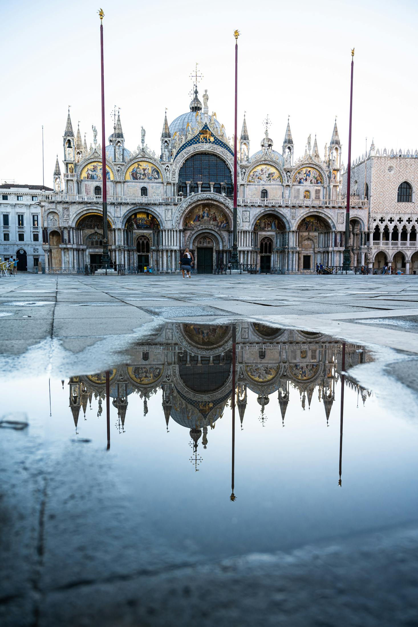 A reflection in a puddle at Piazza San Marco, Venice, Italy