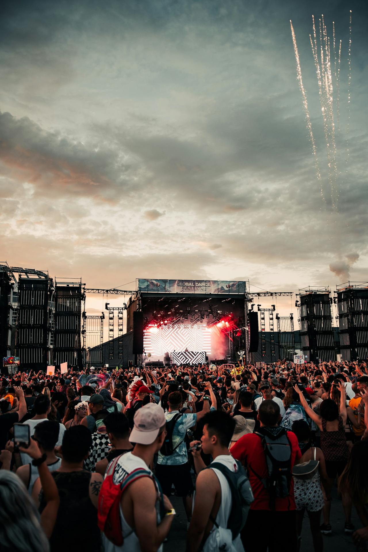 Festival crowd at a concert at sunset