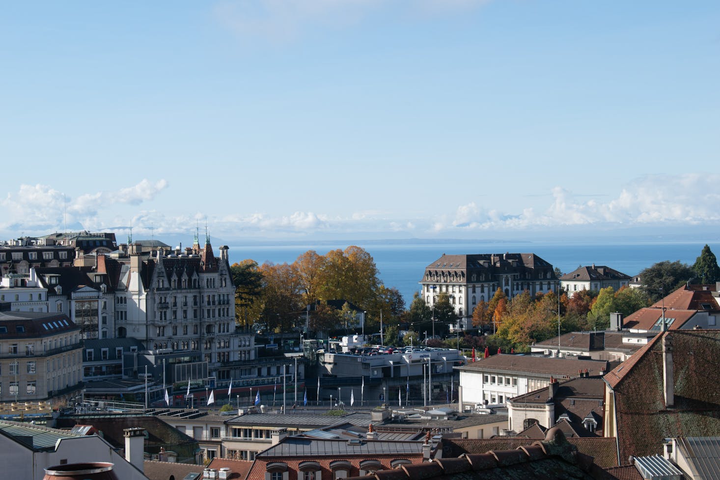 The rooftops of Lausanne, Switzerland, with Lake Geneva in the distance