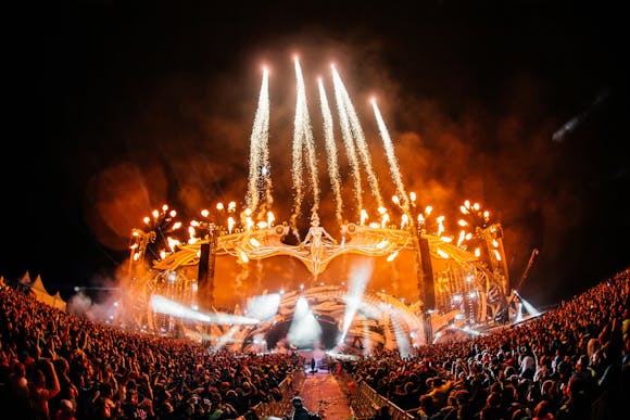 Fireworks during a crowded festival show at night