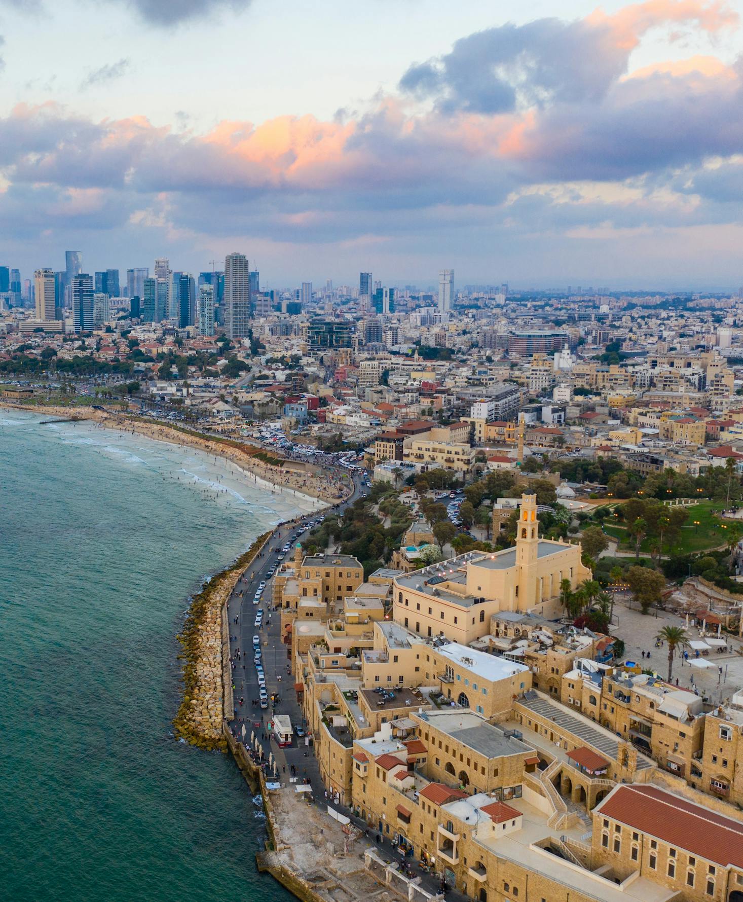 Aerial view of Tel Aviv with buildings and the coastline