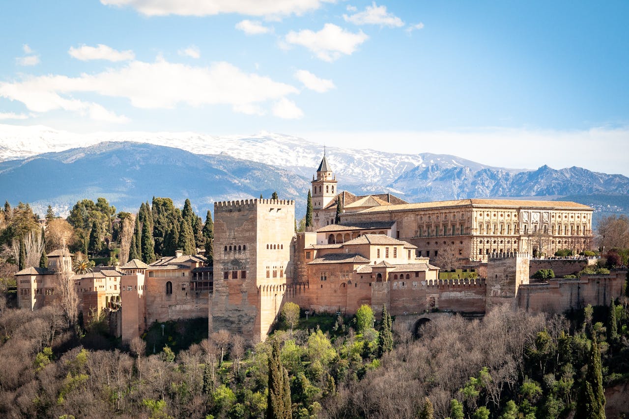 View of Granada, Spain, with mountains in the distance View of Granada, Spain, with mountains in the distance