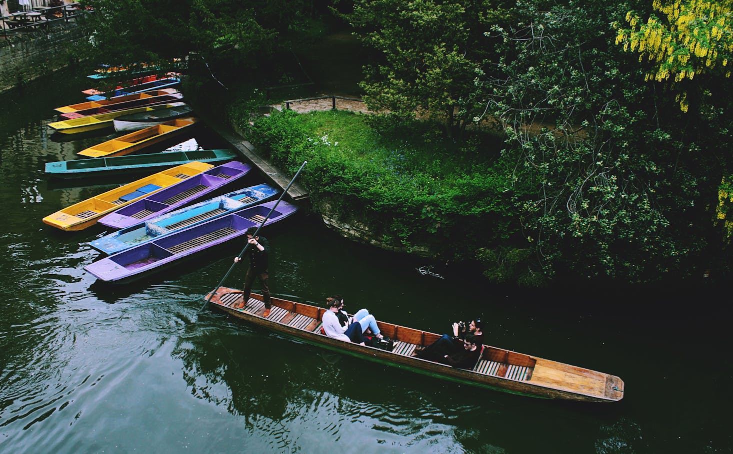 colored boats in canal