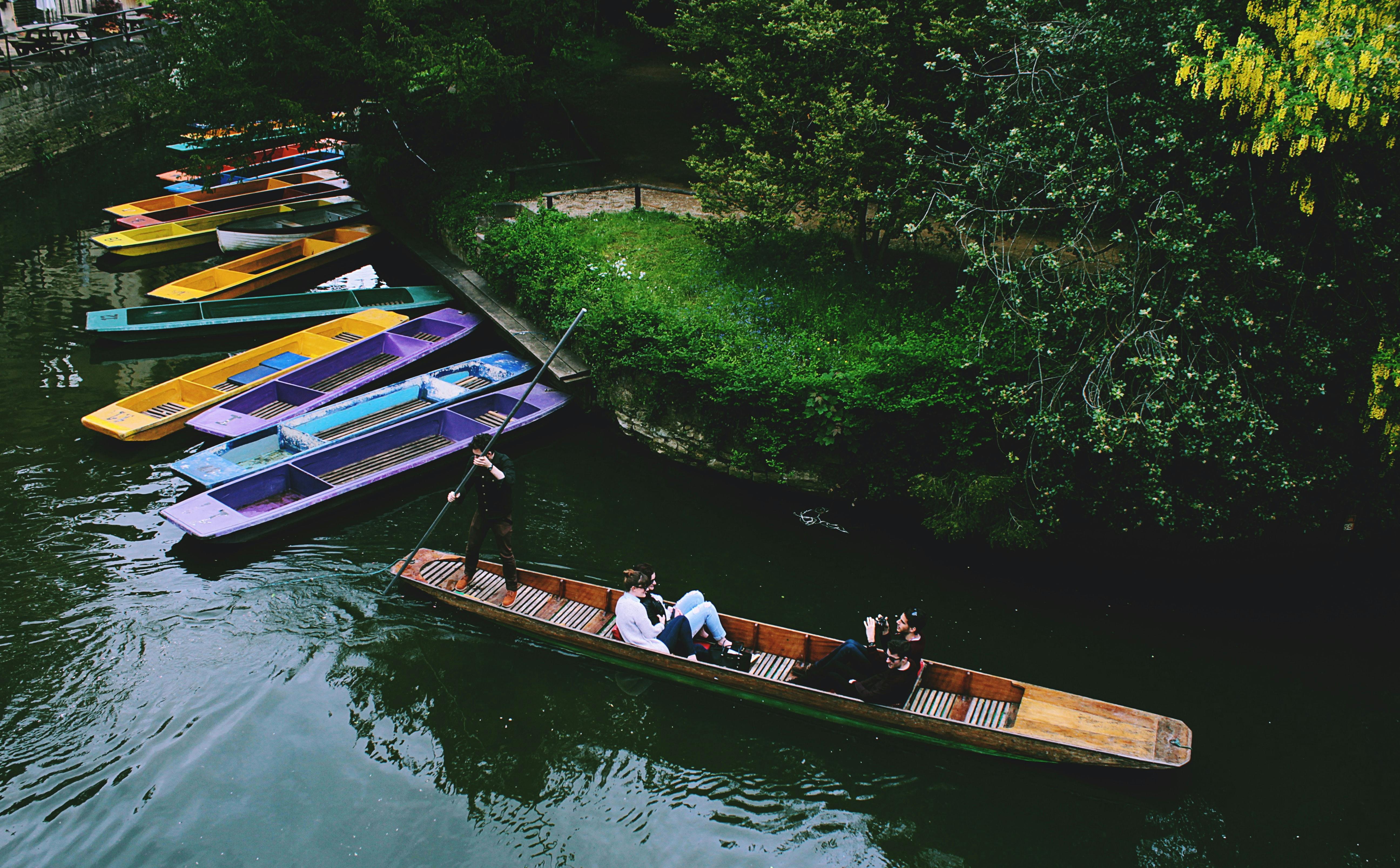 colored boats in canal